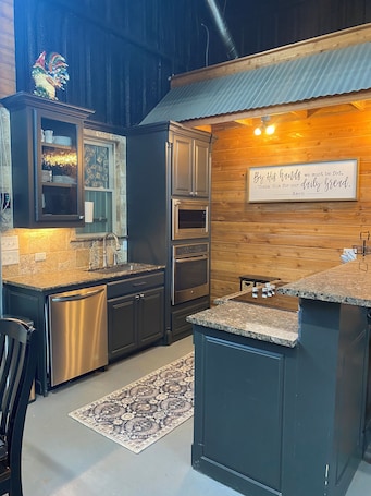 Microwave, oven, stovetop, dishwasher. 3-bedroom barndominium, family friendly, pet friendly setting with lots of space