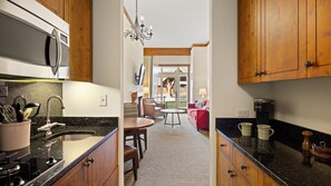 Microwave, stovetop, dishwasher, coffee/tea maker - Spruce Peak Lodge | One Bedroom | Alpine Getaway (Stowe)