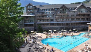 A heated pool - Spruce Peak Lodge | One Bedroom | Alpine Getaway (Stowe)