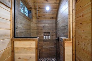 Shower, hair dryer, towels, shampoo - Modern Glass Cabin w/ Hot Tub & Fireplaces (Broken Bow)