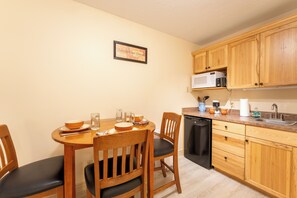Fridge, microwave, coffee/tea maker, cookware/dishes/utensils - Marina Cay Condo | Sleeps 4 | Steps from Flathead Lake, Bigfork Village & Glacier Country (Bigfork)