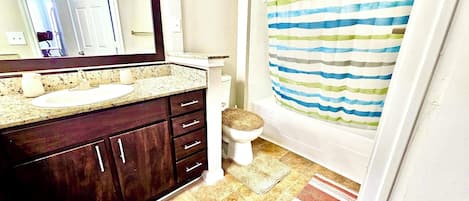 Hair dryer, towels, soap, toilet paper
