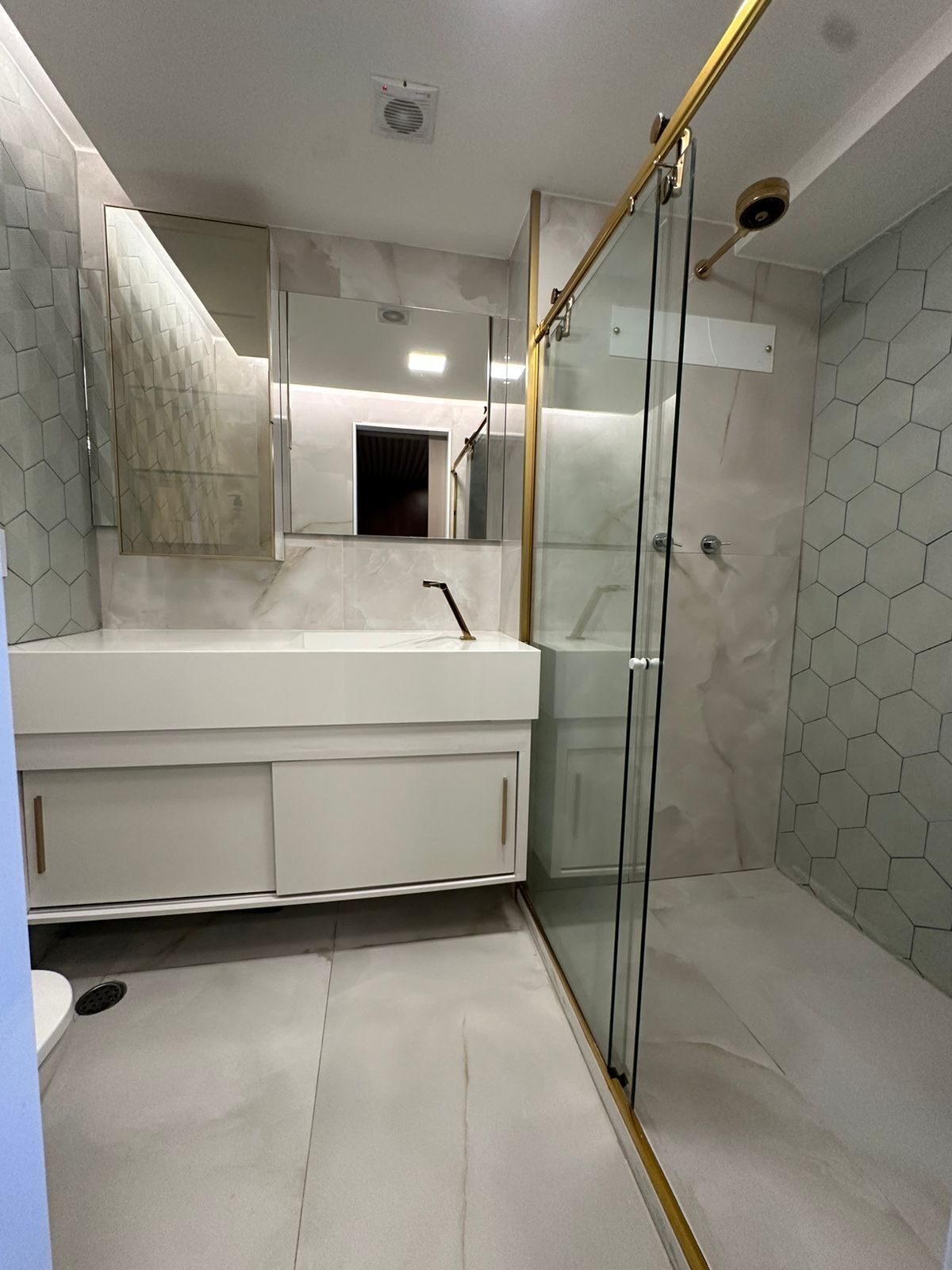 Shower, hair dryer, towels, toilet paper
