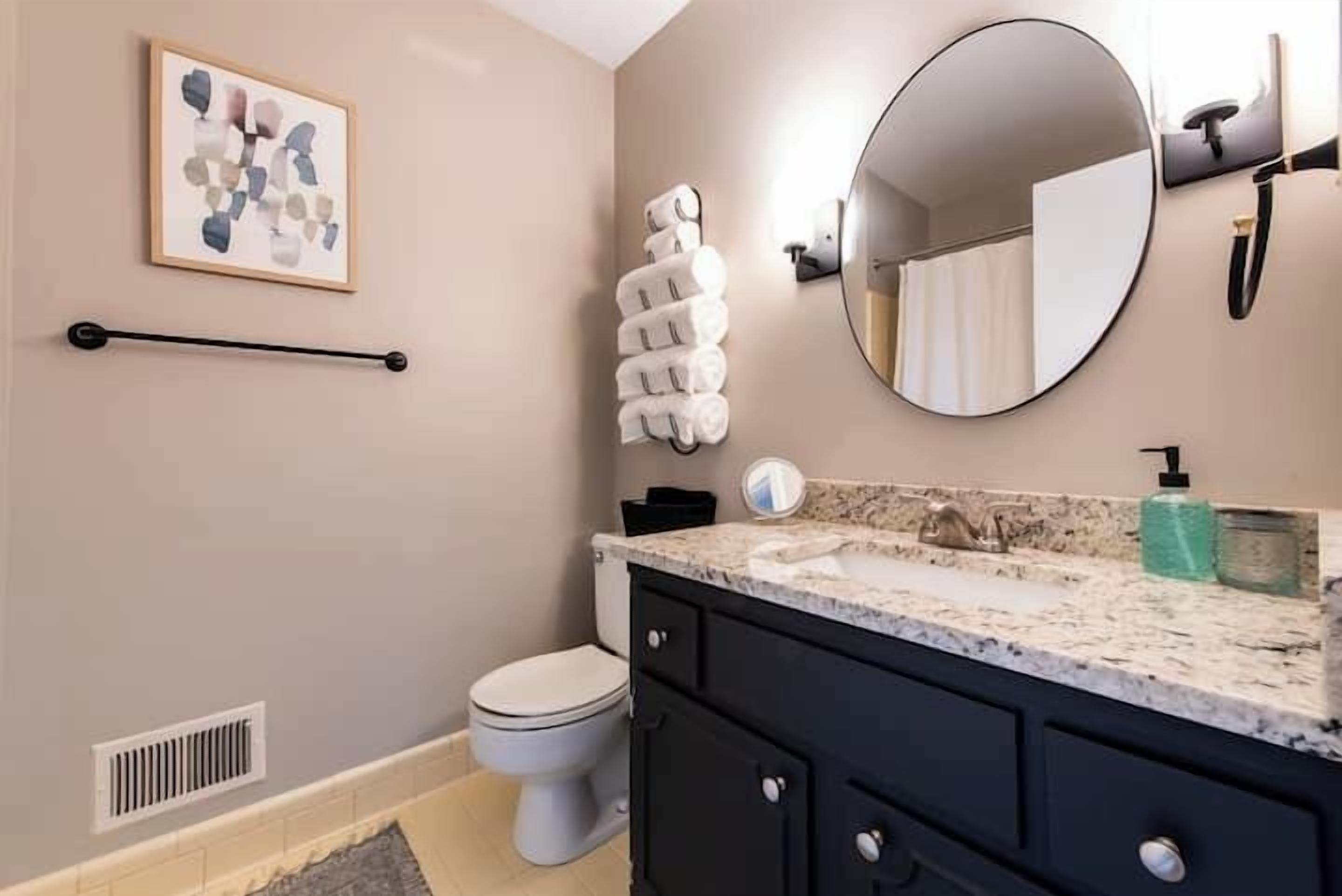 Shower, hair dryer, towels, shampoo