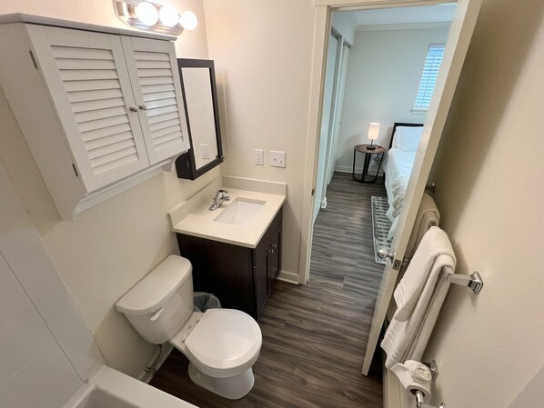 Hair dryer, towels, soap, toilet paper