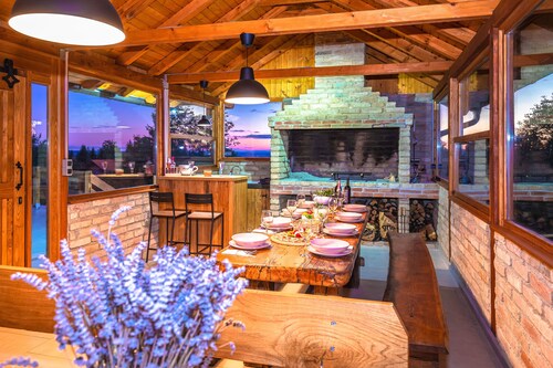 Modern wooden home with pool and spacious yard near the Kupa River.