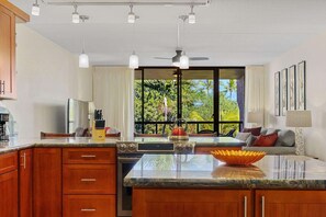 Fridge, microwave, oven, stovetop - Kona Pacific B411 - Garden View Kona Condo | Walk to Town & Ironman (Kailua Kona)