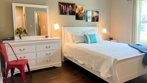A bedroom with a bed, dresser, mirror, and artwork on the wall. - Salty Silo Bed & Breakfast, Breakfast upon request prior to arrival please! (Rockport)