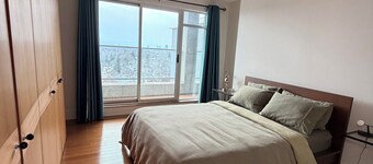 Charming 2-Bedroom Penthouse, Steps to Dow's Lake & Little Italy's Best