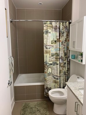 Shower, jetted tub, hair dryer, towels