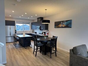 Dining - Comfort Haven | Modern 3BR Smart Home | A/C, WiFi & Free Parking (Calgary)