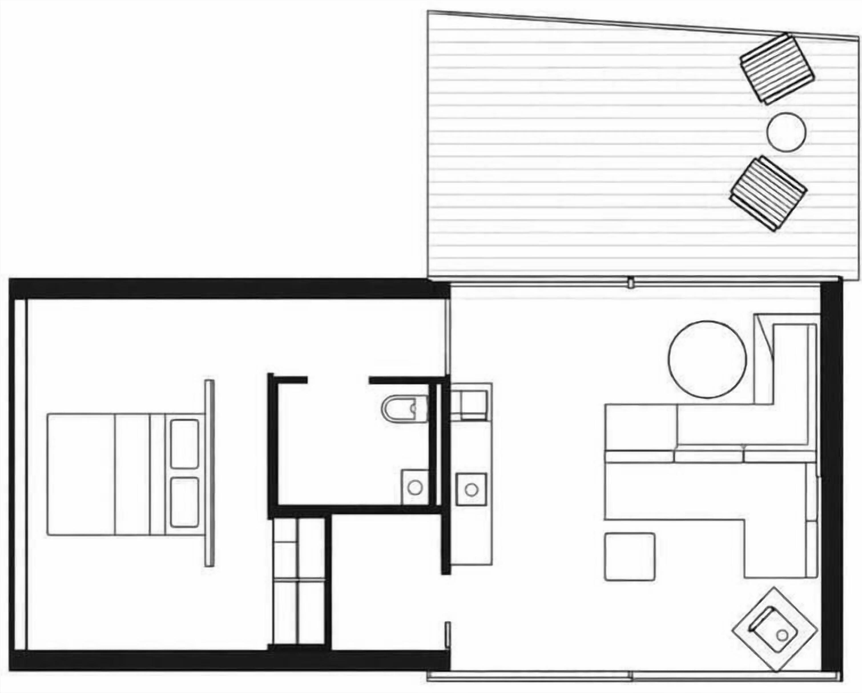 Planta baixa de um quarto de hotel com cama, escrivaninha, banheiro e cozinha compacta.