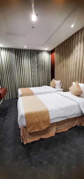 In-room safe, laptop workspace, blackout curtains, soundproofing