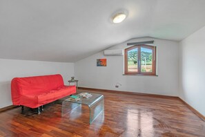 Family Apartment, Multiple Bedrooms (Villa Adriana Capalbio) | Living area | Fireplace - Villa Adriana Capalbio (Capalbio)
