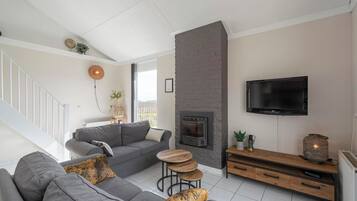 Comfort huis, 3 slaapkamers | Woonkamer | Een open haard