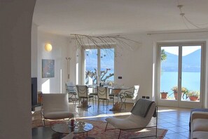 Dining - Villa Alborella: A bright four-story villa situated on a promontory facing the lake, with Free WI-FI. (Oggebbio)