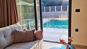 Camera Deluxe, vista mare | Area soggiorno