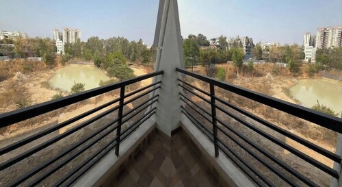 Balcony Deluxe Room with Washroom & Workstation inside a 4BHK Apartment