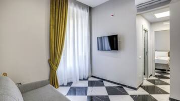 Condo, balcón | Área de sala de estar