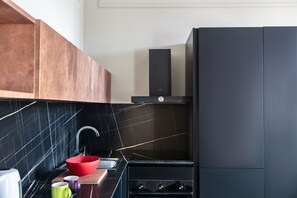 Condo, sacada, vista para a cidade | Cozinha privada