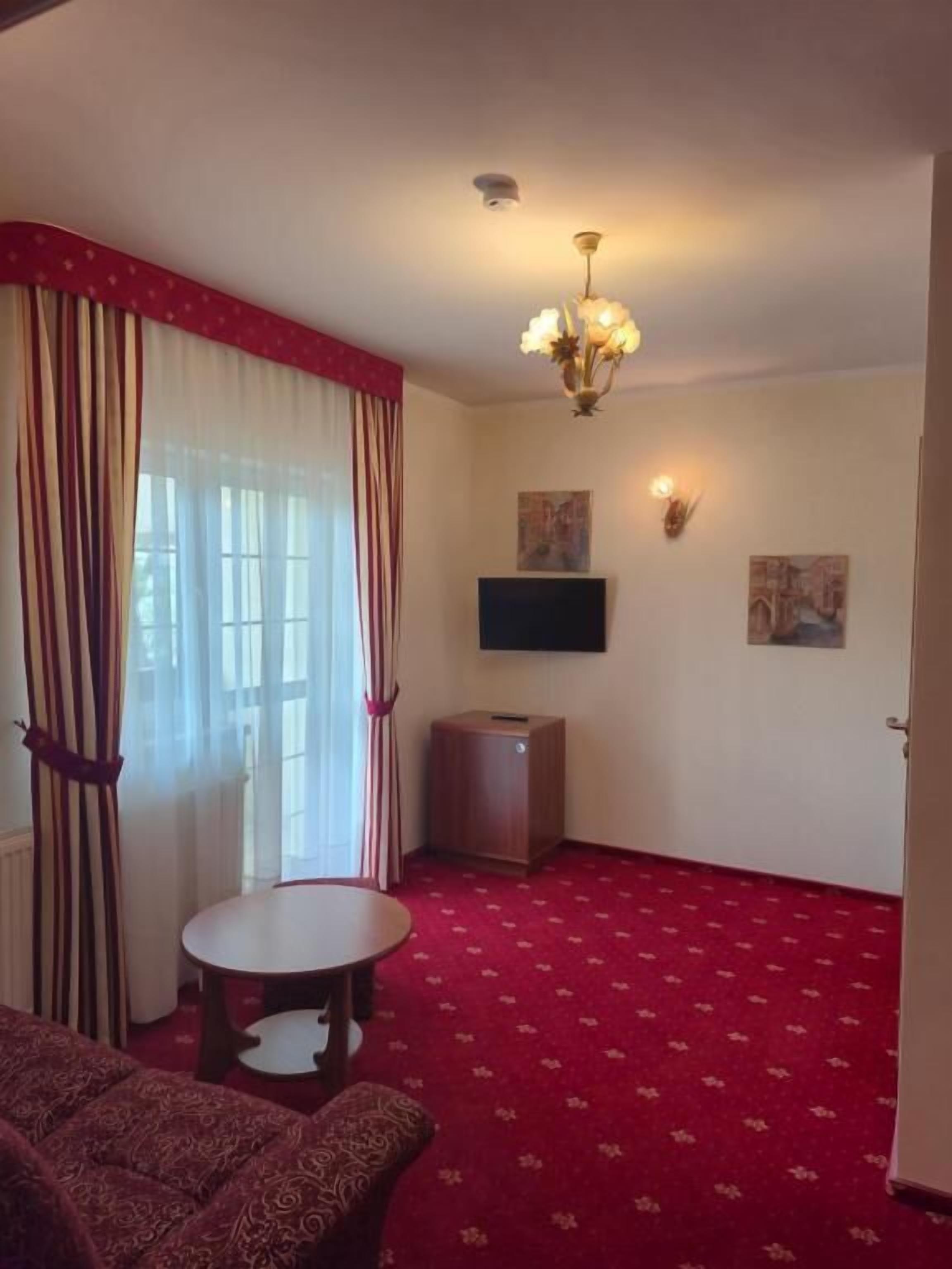 Appartement Familial, vue jardin | Coin séjour