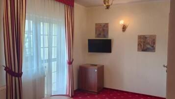 Appartement Familial, vue jardin | Coin séjour