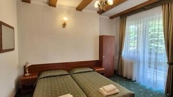 Quarto casal, vista para o jardim | Wi-Fi de cortesia, roupa de cama