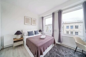 1 habitación, tabla de planchar con plancha, wifi y ropa de cama 