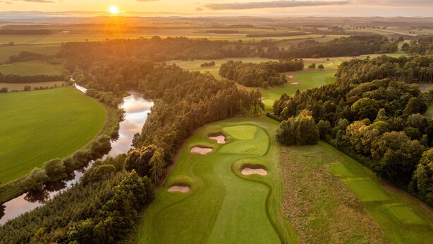 A golf course with a river, trees, and a sunset. - Roxburghe Cottages, Part of Destination by Hyatt (Kelso)