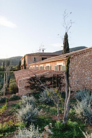 Deluxe Suite, Garden View | Property grounds - Finca Es Cabàs (Santa Maria del Camí)
