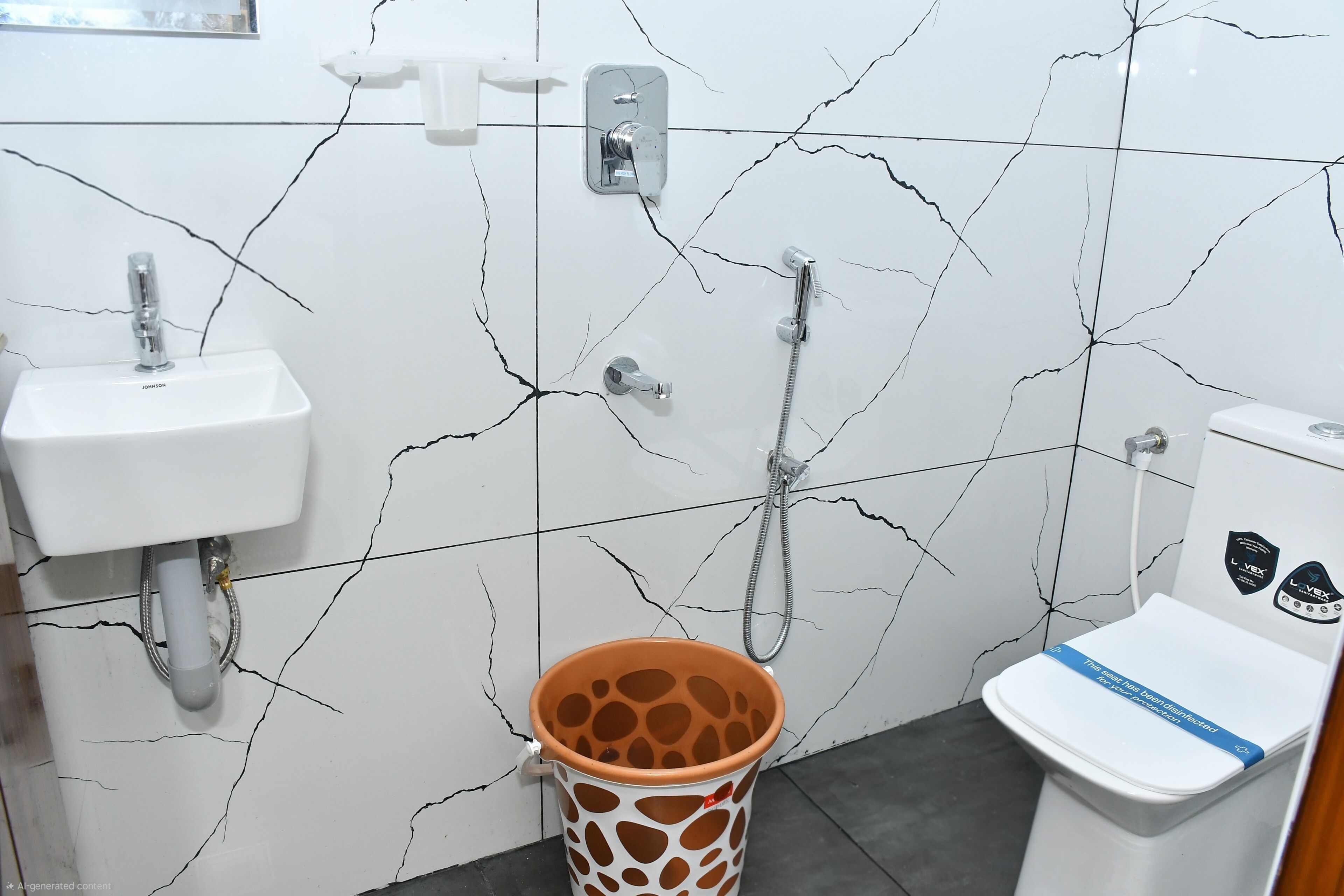 A bathroom with a white sink, a toilet, and a shower.