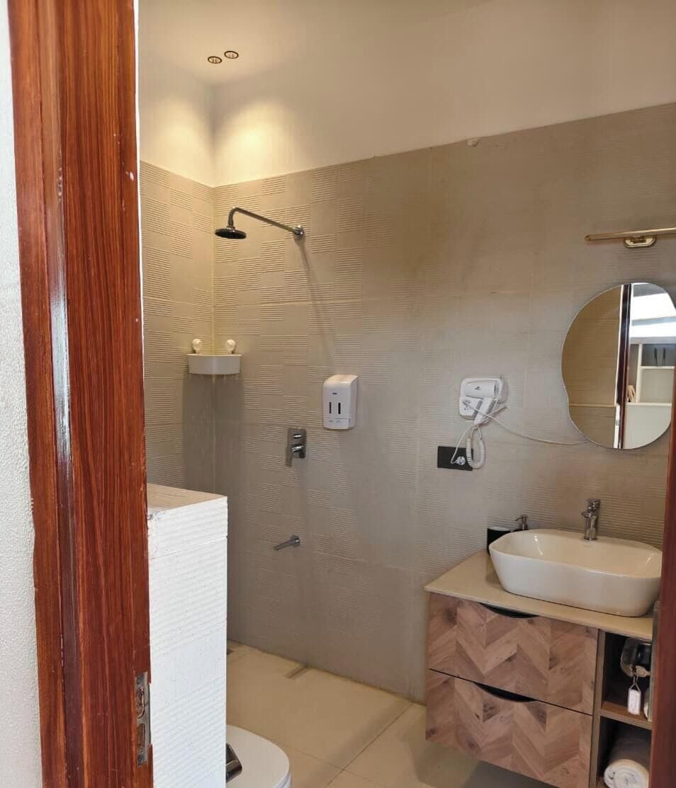 Comfort Room, Hill View | Bathroom | Hair dryer, slippers, towels, soap