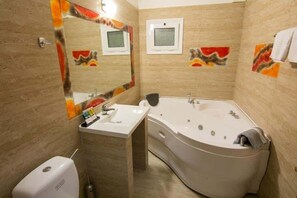 Shower, hair dryer, towels, shampoo