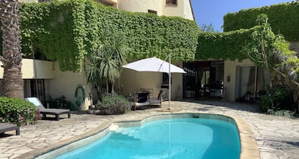 Sunny studio Cottage in private mature garden with pool, secure parking,
