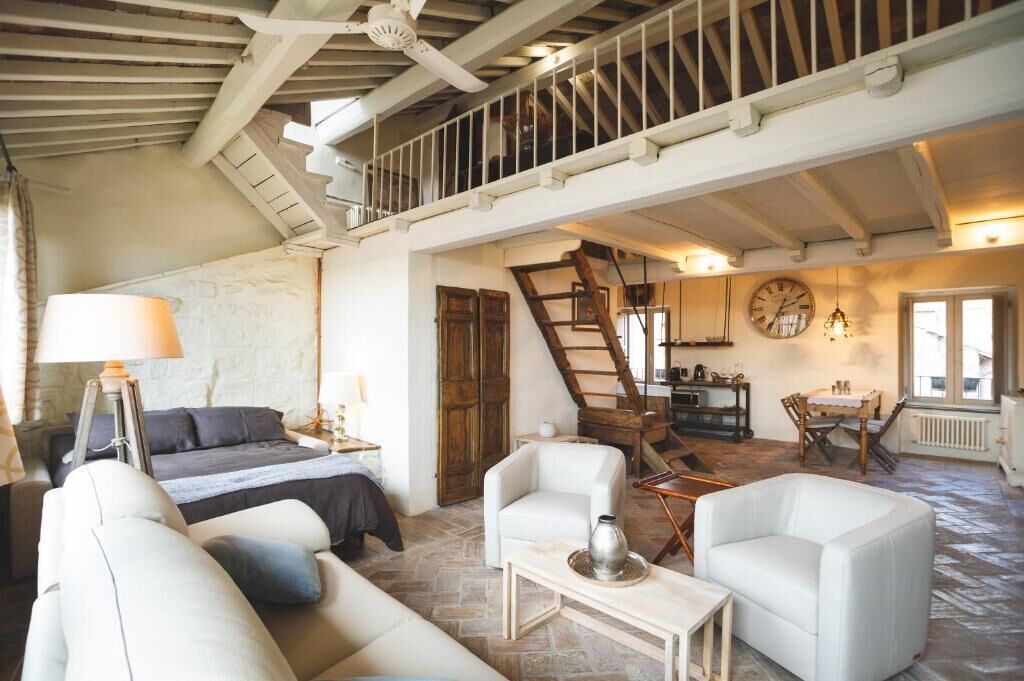 Deluxe-Suite, Balkon, Stadtblick | Wohnbereich