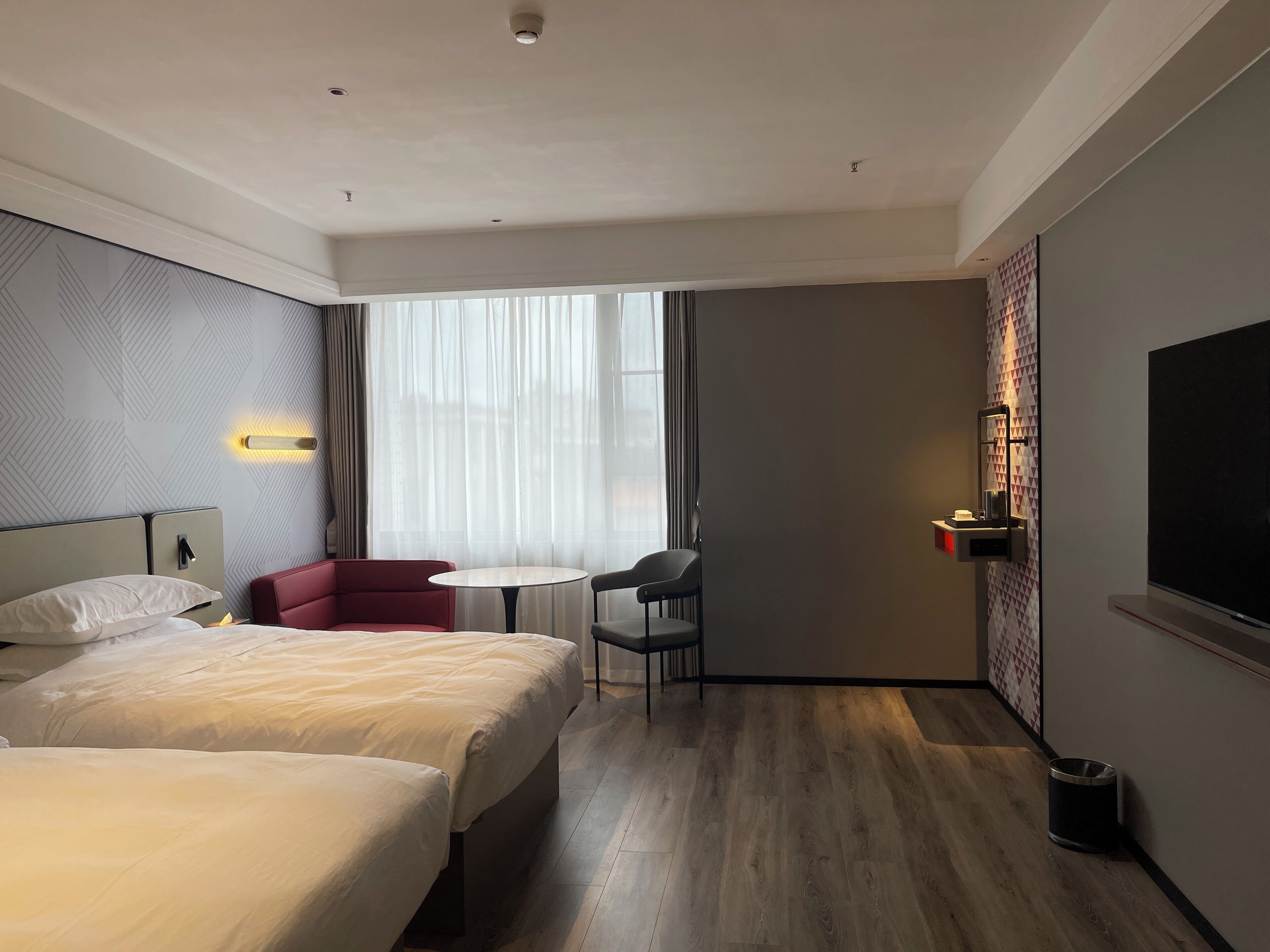 Quarto duplo família, vista para a cidade