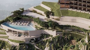 Et moderne resort med swimmingpool, terrasseanlagte haver og et unikt arkitektonisk design.
