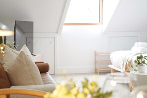 1 slaapkamer, een strijkplank/strijkijzer, reisbedje, wifi