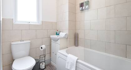 4-Bed Swansea Home with Garden | Sleeps 11 | Ideal for Groups