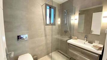 Hair dryer, towels, soap, toilet paper