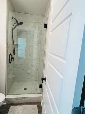 Shower, towels, toilet paper - Spacious Beach Getaway w/ Ocean Views + Balconies - Walk to Everything (Carolina Beach)