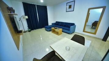 Superior Suite, City View | Living area