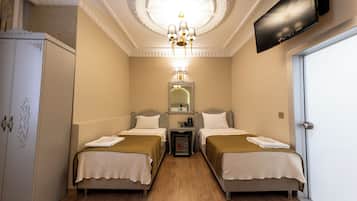 Family Quadruple Room, Courtyard View | Blackout drapes, soundproofing, iron/ironing board, free WiFi
