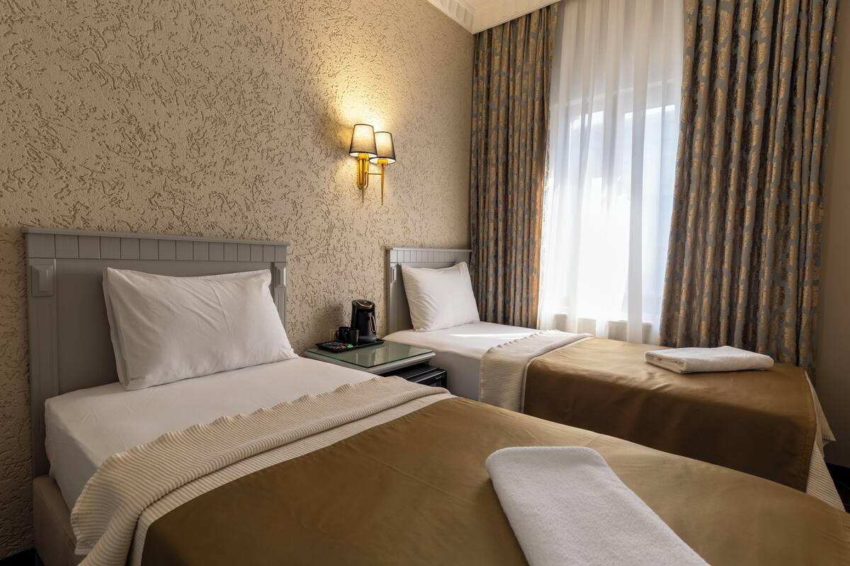 Comfort-Doppel- oder -Zweibettzimmer