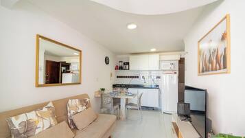 Basic Apartment | Living area | 32-inch Smart TV with digital channels