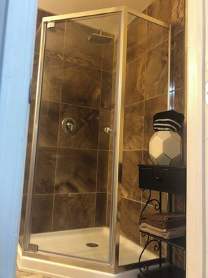 Shower, hair dryer, towels, soap