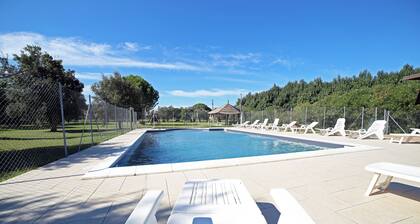 Spacious 8 pers. family apartment with pool near the sea.