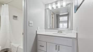 Hair dryer, towels, soap, shampoo