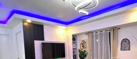 Condo, 1 habitación, alberca privada, vista a la alberca | Sala de estar