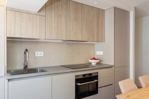 Private kitchen - An architect-designed two-bedroom in Tetuán, finished in soft beige and earth tones, with an open-plan living space on tree-lined streets beside the Bernabéu and the best shopping of Nuevos Ministerios. (MADRID)